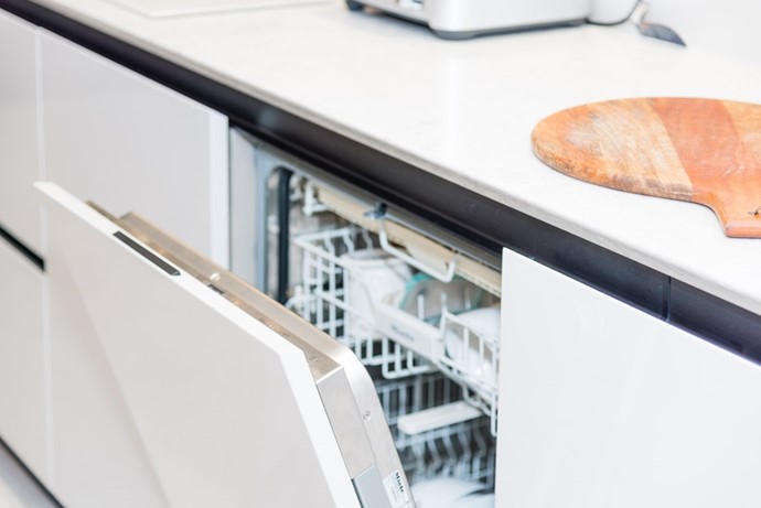 Image of a white integrated kitchen appliance, perfect for small kitchens.
