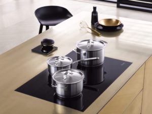 Image of an innovative induction hob integrated into a kitchen island