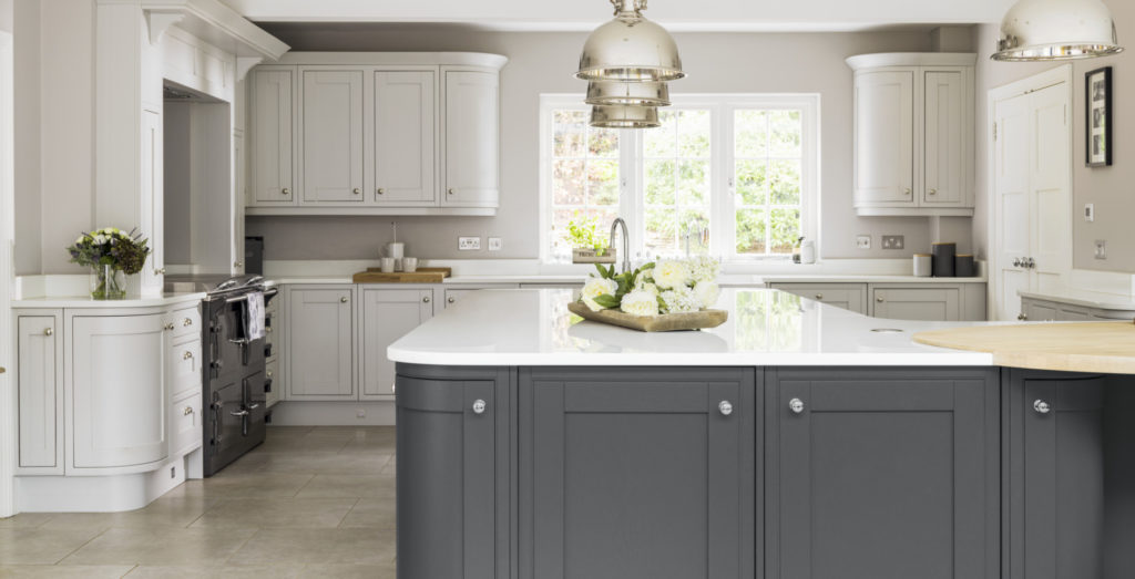 Image of a large traditional kitchen design featuring a balance of white and grey colours.