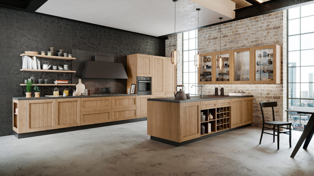 Image of the Frida classic kitchen design with an industrial style, featuring wooden kitchen units, brick walls, and black worktops.