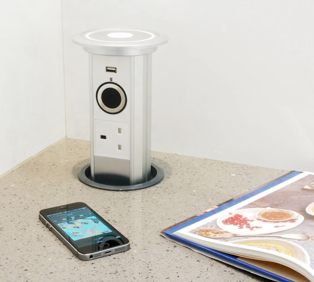 Image of an integrated electrical socket in the kitchen worktop.