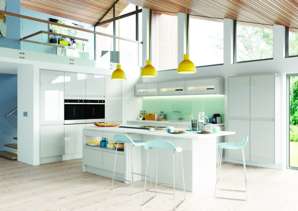 A contemporary white kitchen with pale blue accents
